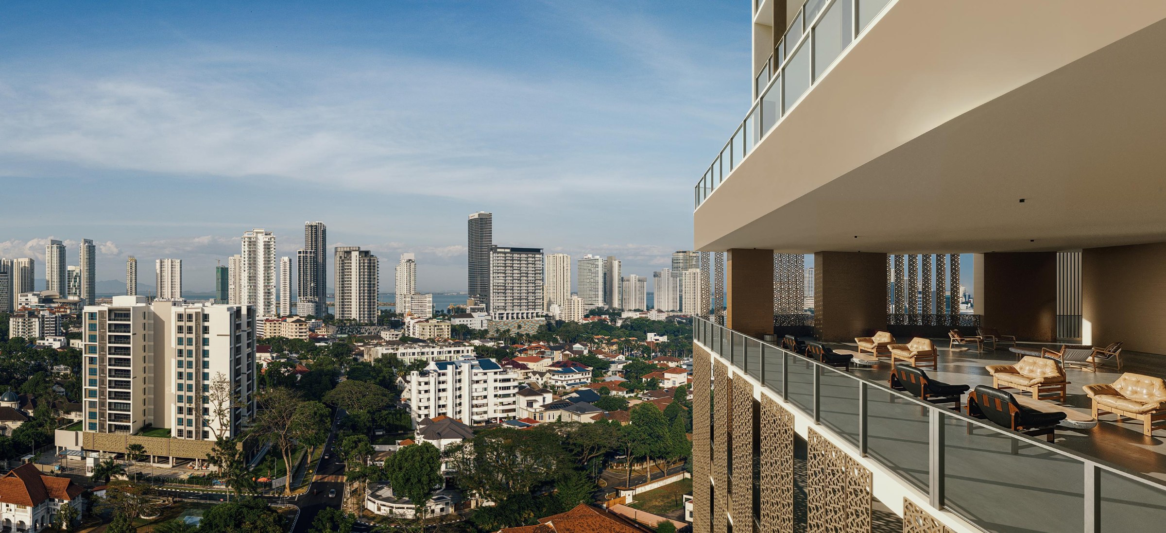 Sky Lounge and illustrative Penang panorama; unit-specific views are not promised.